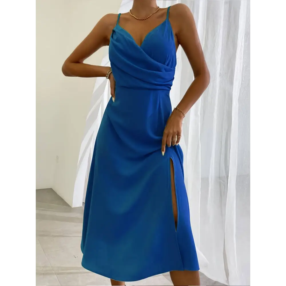 A vibrant royal blue satin slit sling dress midi with draped bodice and side slit for sling dress summer fashion