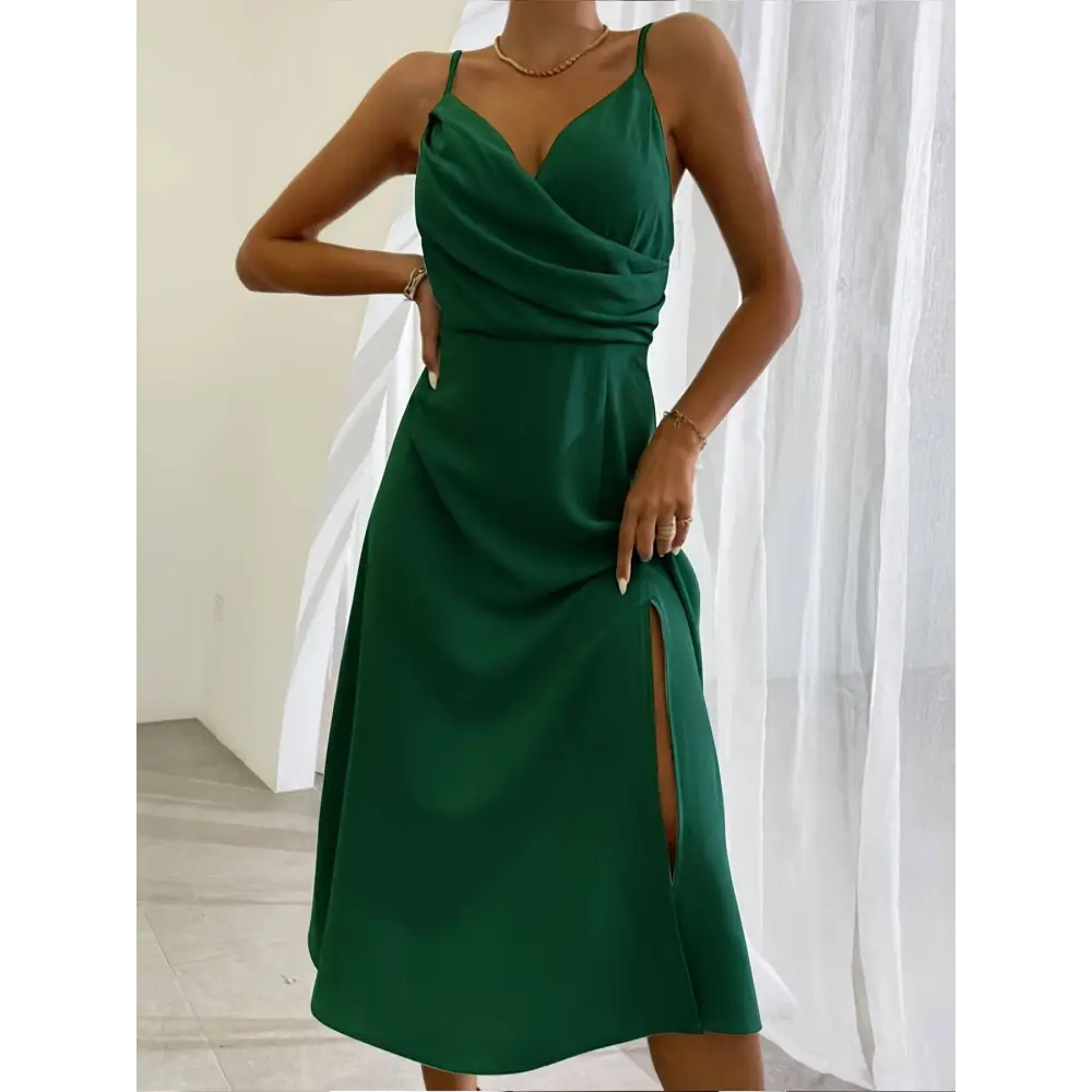 Emerald green satin slit sling dress with draped bodice and side slit perfect for sling dress summer fashion