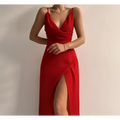 A vibrant red satin slit sling maxi dress with a plunging neckline and high slit for sling dress summer fashion