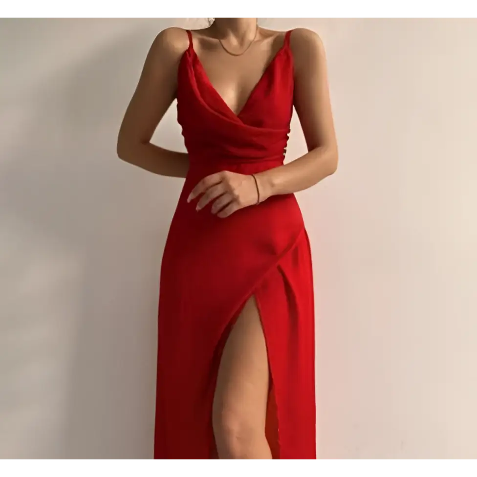 A vibrant red satin slit sling maxi dress with a plunging neckline and high slit for sling dress summer fashion