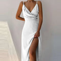 White satin slit sling dress with thin spaghetti straps and high slit perfect for sling dress summer fashion