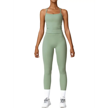 A sleek sage green seamless womens workout set with fitted tank top and high-waisted leggings for active wear
