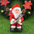 Red and white plush santa claus figurine seated in rocking chair holding miniature violin for climbing rainbow parachute toy