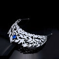 Silver leaf-patterned sparkling silver tiara with copper micro inlay and central blue gemstone sapphire crown copper