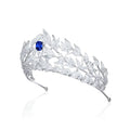A sparkling silver tiara with copper micro inlay and a central blue sapphire in a sapphire crown copper design