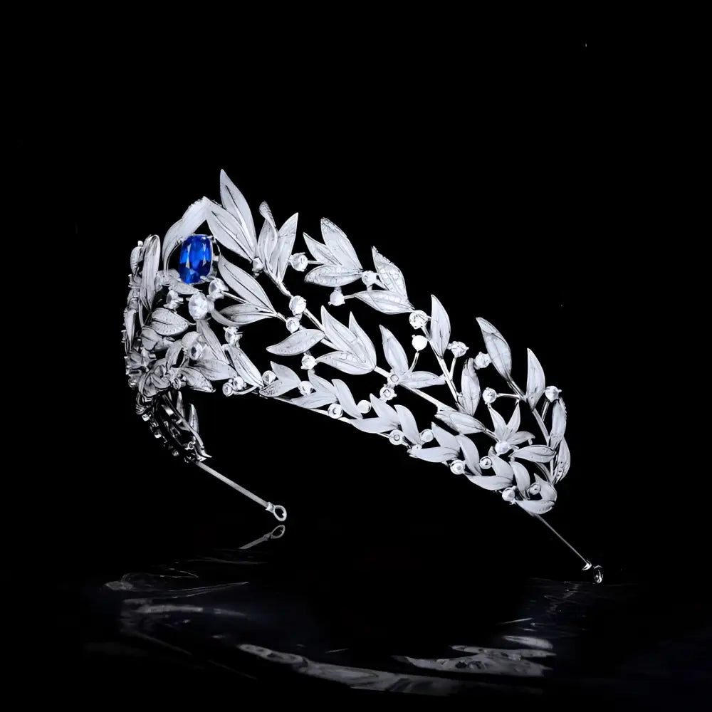Elegant sparkling silver tiara with copper micro inlay featuring a sapphire crown and intricate leaf motifs