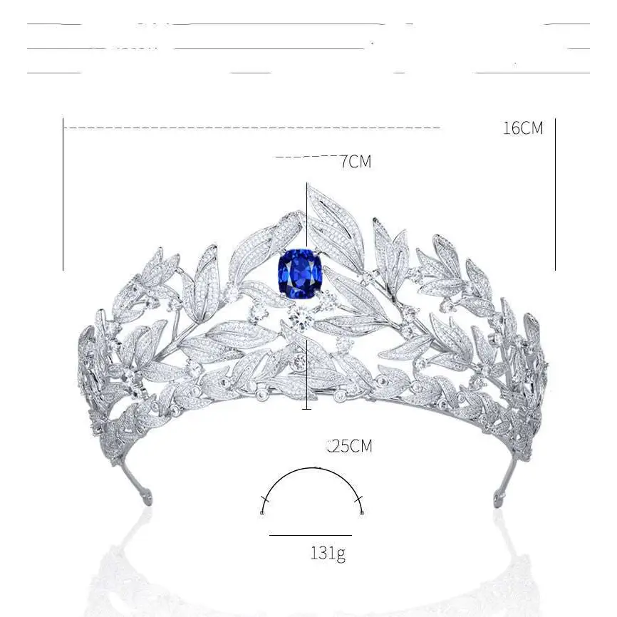 A sparkling silver tiara with copper micro inlay featuring intricate leaf designs and a central cushion-cut blue sapphire sapphire crown copper