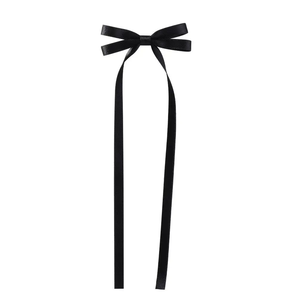 Black satin bow braided hair ribbon tie set featuring a neat bow with long flowing tails for braided hair styling