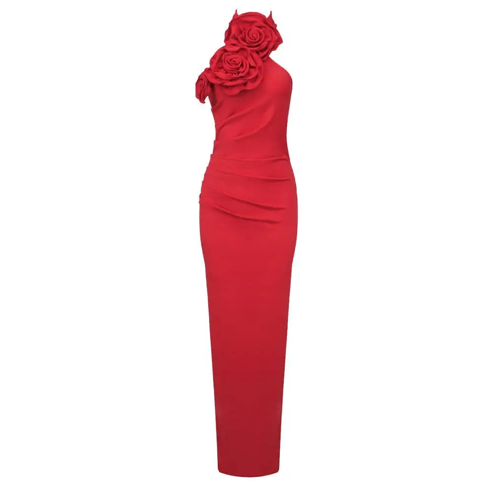 A striking red flower halter gown featuring a satin white ribbon and sculpted floral embellishment on one shoulder
