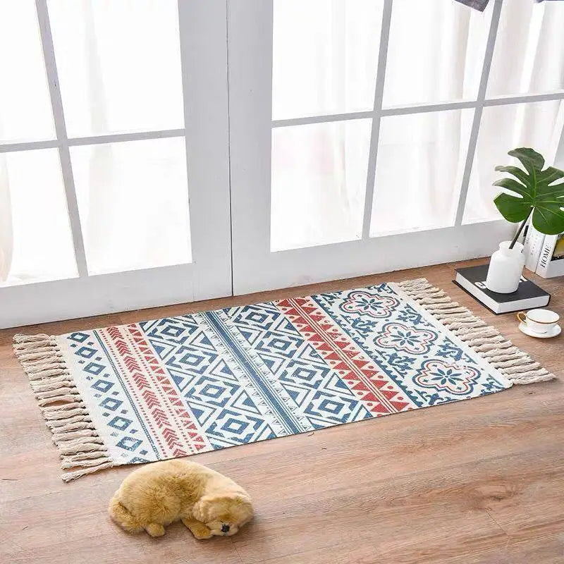 Scandinavian style linen cotton rug with tassels featuring a blue red and white geometric pattern in rectangular form