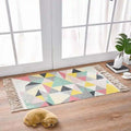 Scandinavian style linen cotton rug with geometric pattern in pastel and bold hues and fringed tassel edges