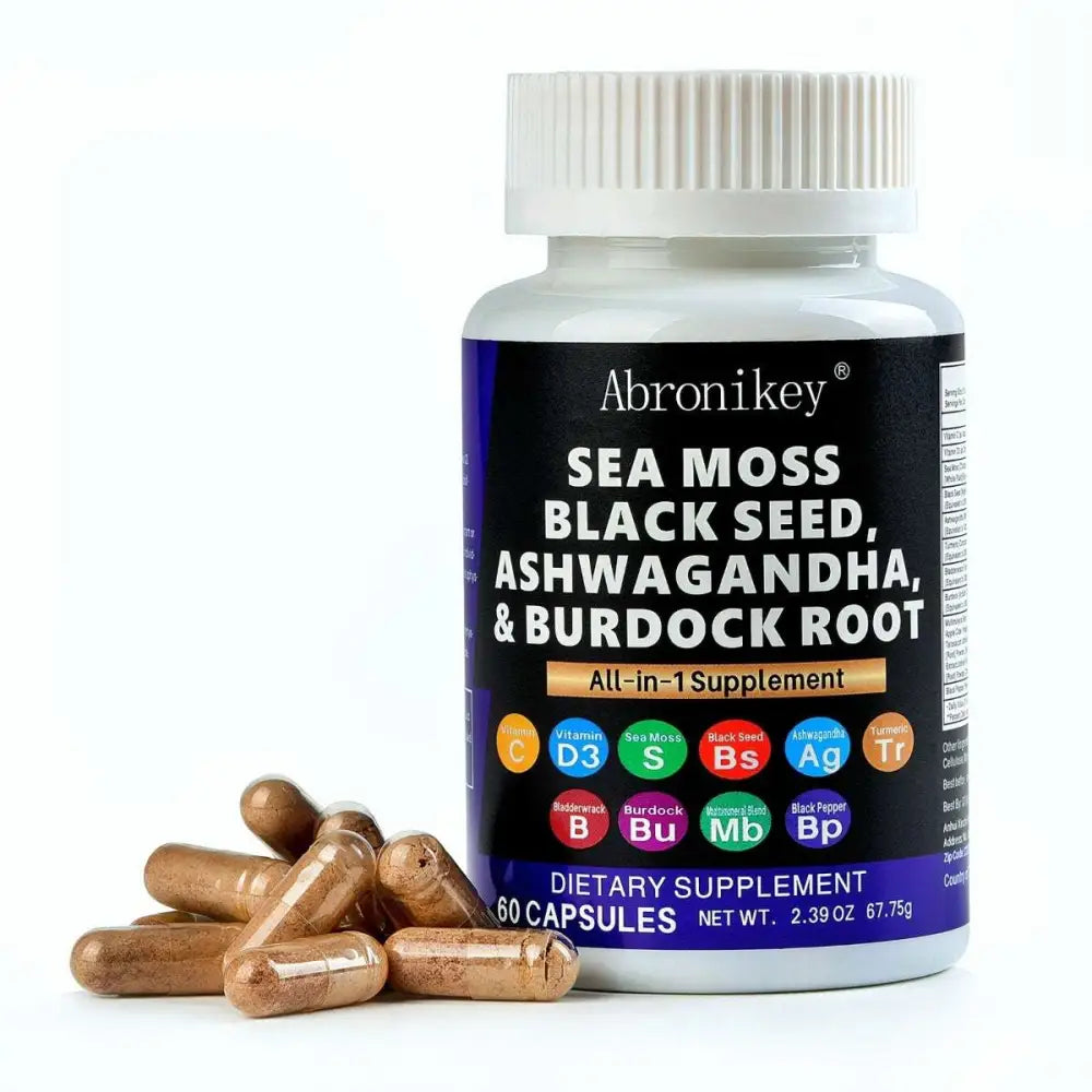 A white plastic bottle of abronikay sea moss and black seed oil capsules with ashwagandha extract and other ingredients