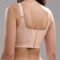 Beige plus size bra featuring adjustable straps and a central lace-up back panel from royale essence lux
