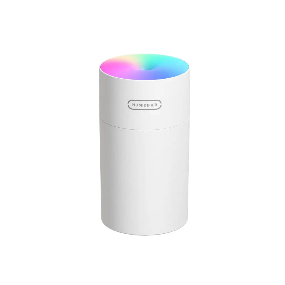 Two cylindrical colorful cup humidifiers usb in gray and peach with rainbow-lit tops emitting mist