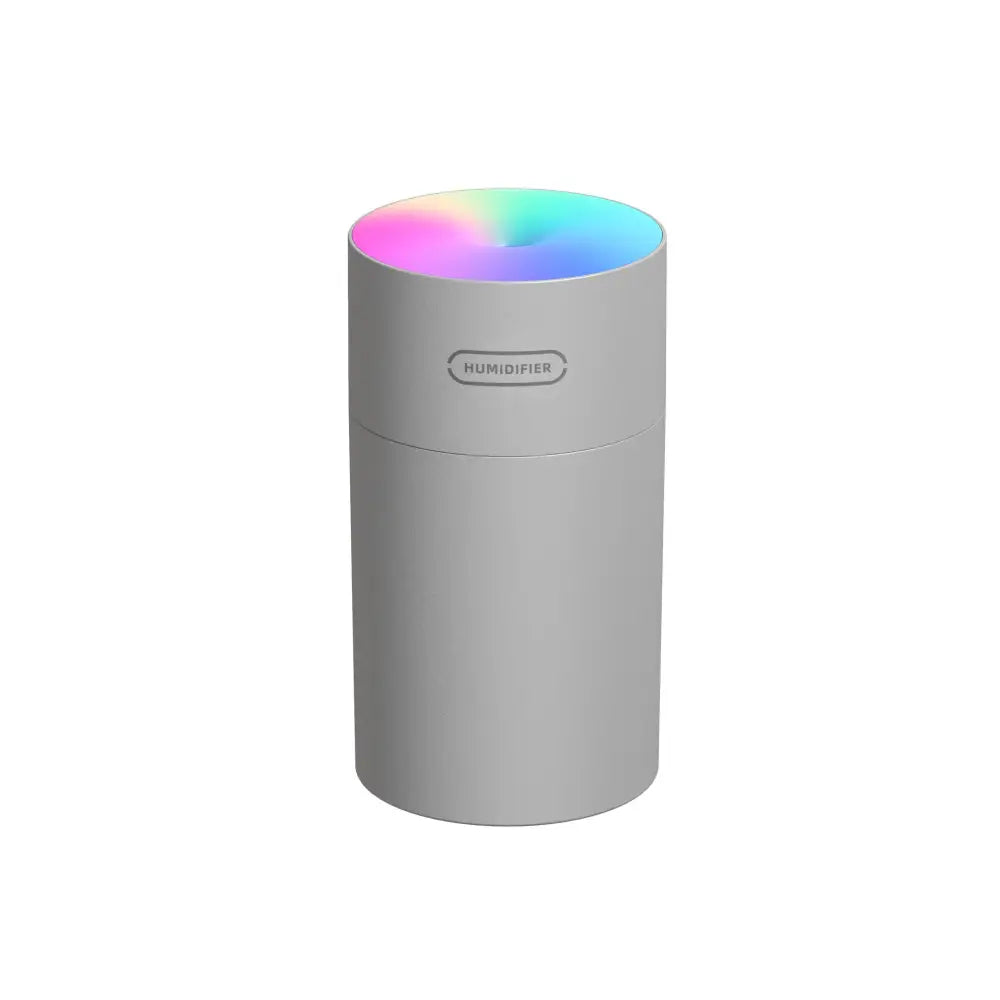 Gray cylindrical second generation colorful cup humidifier usb with rainbow-lit top and humidifier label