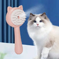 Pink cat-shaped self-cleaning mist cat and dog grooming brush with white bristles and smooth handle for easy grooming