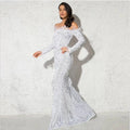A shimmering white mermaid-style gown with long sleeves and feathered shoulder accents in burgundy feather fishtail design