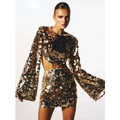 A shimmering gold and black sequined angel two-piece outfit with long sleeve round neck and flared sleeves