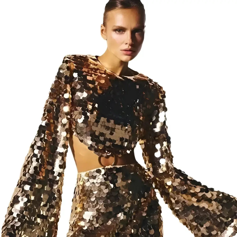 Sequined angel long sleeve round neck evening dress in shimmering black and gold sequins with feathered wings