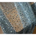Sheer lace asymmetric dress featuring pearl embroidery lace with densely packed silver and black sequins detailing