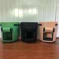 Set of 3 fabric potato planting bags in green black and beige with windows and contrasting black trim
