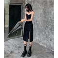 Black velvet midi dress with sweetheart neckline and side slit paired with white leopard print chain satin slip dress