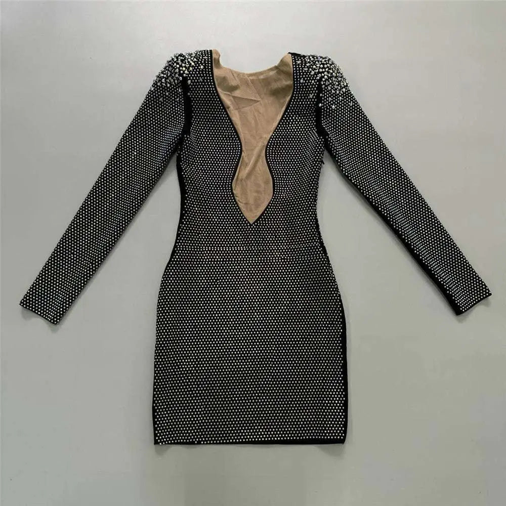 Black sexy rhinestone bandage long sleeve mini dress featuring dense white rhinestones and a plunging neckline