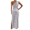 A shimmering silver sequined shoulder sleeping beauty split dress with a fitted silhouette and high slit maxi length