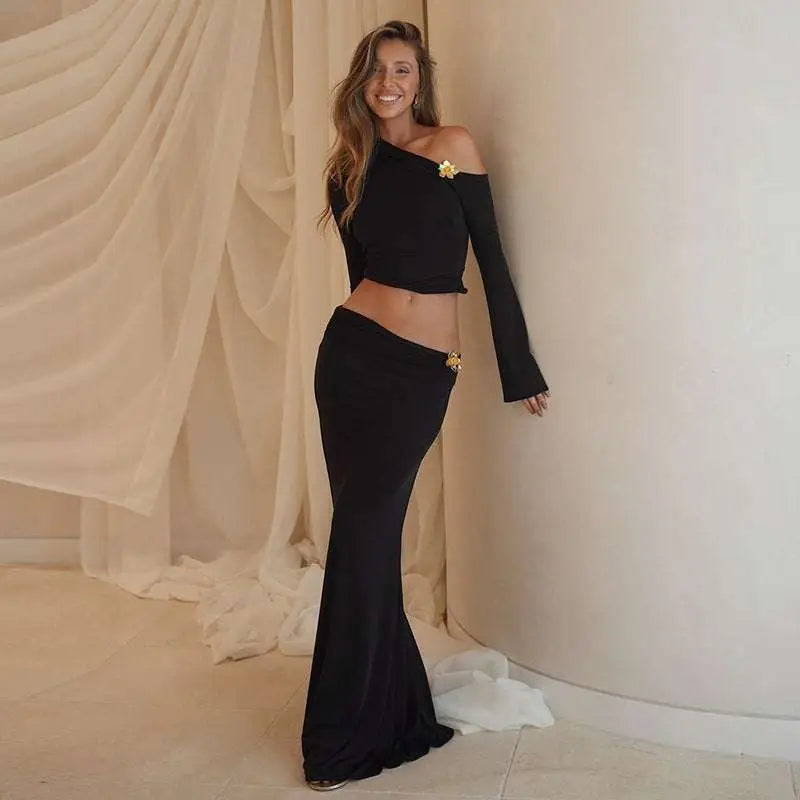 Black off-the-shoulder crop top with gold floral embellishments styled as a sexy slim oblique shoulder floral mermaid dress