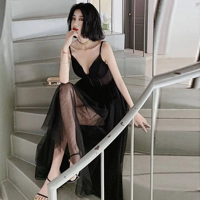 Black sheer mesh overlay sexy suspenders gauze evening dress with deep v-neckline and thin spaghetti straps