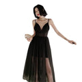 Elegant black sexy suspenders gauze evening dress with sheer mesh overlay, plunging neckline, and thin spaghetti straps