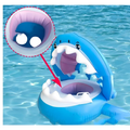 Blue inflatable shark seat ring with white teeth purple interior cartoon eyes and awning for swimming use
