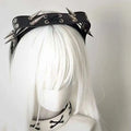 Sharp Claw Kitty rivet headband in black leather with silver-toned spikes and decorative metal eyelets from kitty leather collection