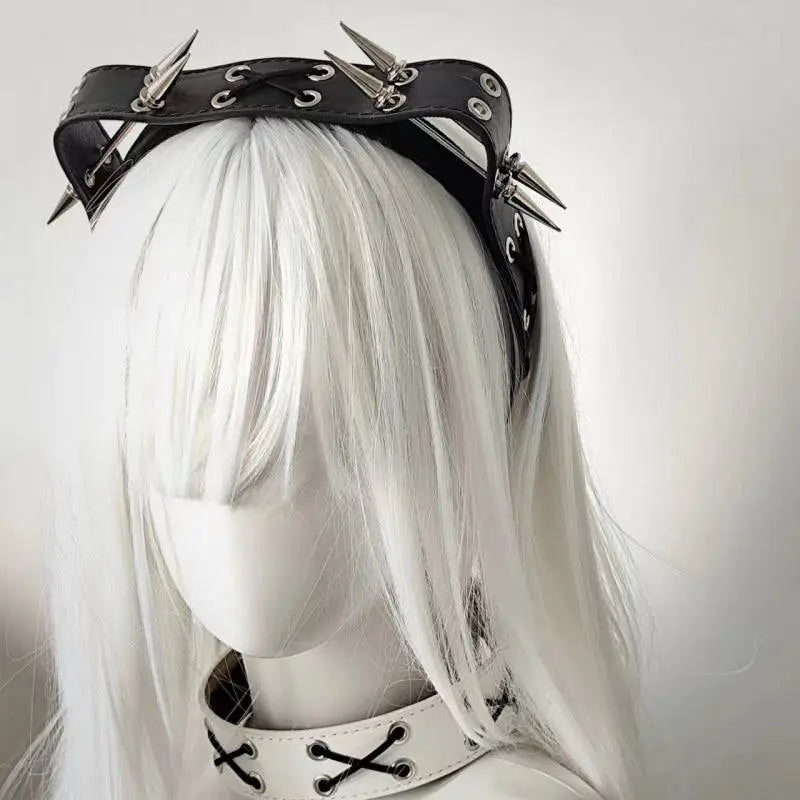 Black leather rivet headband with silver-toned spikes and metal eyelets from the sharp claw kitty leather collection