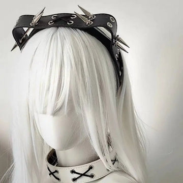 Black leather rivet headband with silver-toned spikes and metal eyelets from the sharp claw kitty leather collection
