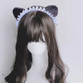 Black and white sharp claw kitty rivet headband with plush ears and ruffled lace from kitty leather collection