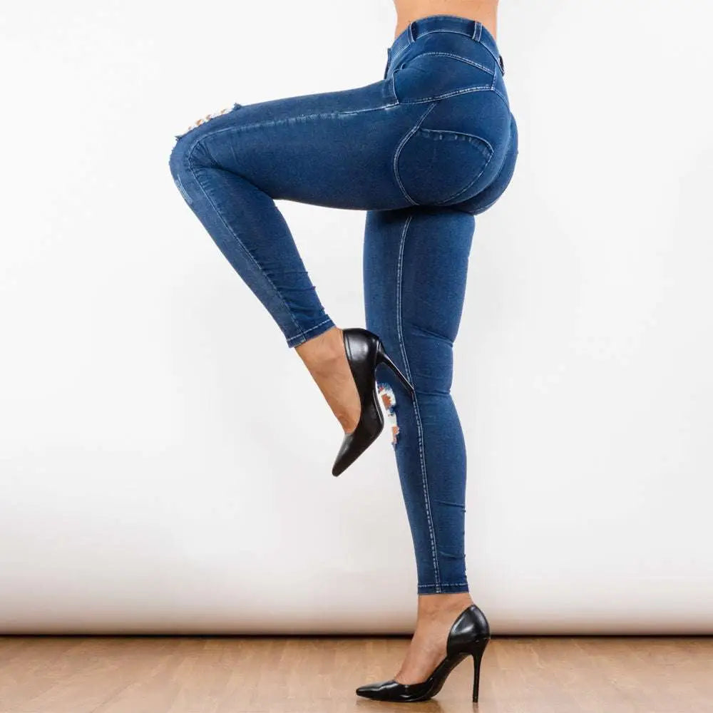 Dark blue denim jeans with distressed ripped knees and high waist in shascullfites melody blue ripped lifting jeggings