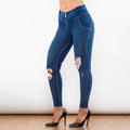 Dark blue denim jeans with distressed ripped knee details and high-waisted fit in shascullfites melody blue ripped lifting jeggings