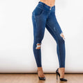 Dark blue denim jeans with high-waisted design and ripped knees shascullfites melody blue ripped lifting jeggings