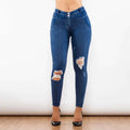 Dark blue denim jeans with high-waisted fit and ripped knees in shascullfites melody blue ripped lifting jeggings style