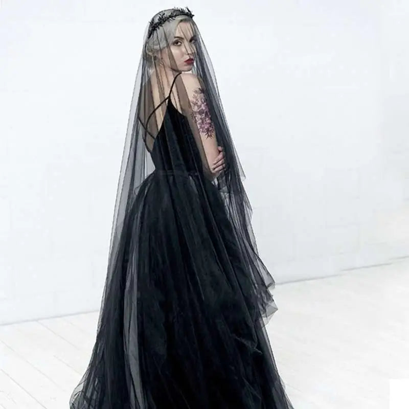 Black veil made of sheer tulle with delicate lace headpiece for a sheer bride wedding black veil ensemble