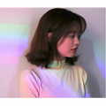 Shell rainbow projection hair removal light with a soft pastel pink and pale yellow high neck sweater gradient design
