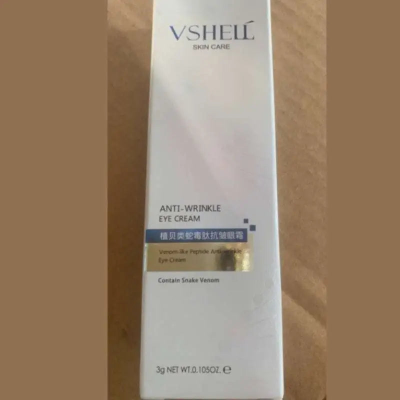 White rectangular box of vshell shellfish peptide anti-aging anti-wrinkle eye cream with sleek modern design and blue gold accents