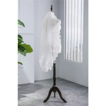 Short veil soft mesh sequined lace white ivory with delicate floral patterns draped elegantly over a mannequin head