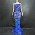 A dazzling royal blue sexy elegant fishtail gown with shimmering silver beaded diagonal accent and cascading fringe