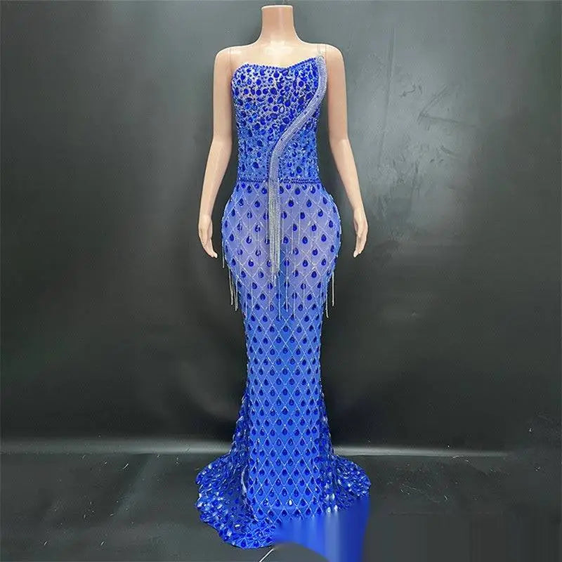A dazzling royal blue sexy elegant fishtail gown with shimmering silver beaded diagonal accent and cascading fringe