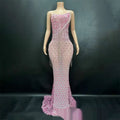 A shimmering silver beaded sexy elegant fishtail gown in pink with intricate beading and delicate fringe detailing