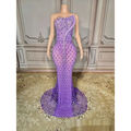 A shimmering silver beaded sexy elegant fishtail gown in lavender with intricate beading and a sheer fitted bodice