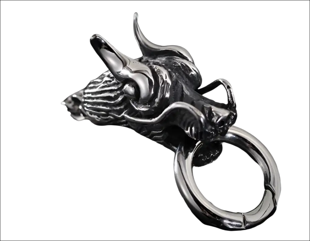 Silver dragon head keychain with intricate detailing and polished metallic finish complements double dragon bracelet designs