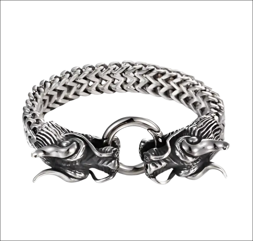 Silver braided double dragon bracelet featuring a silver-toned stainless steel dragon head and intricate braided chain links